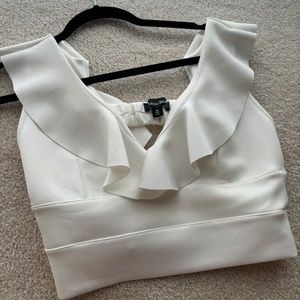 White short ruffled top